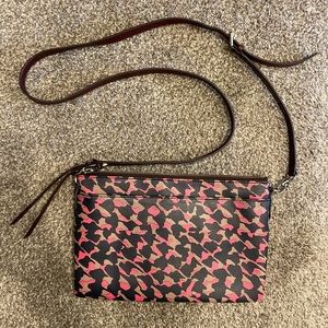 Pink, brown, and black Fossil Crossbody purse